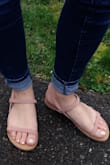 These sandals are really cute and comfortable. It fits true to size but they are a little wide. The material is really good for this price! I can't wait to wear it! - Alexandra O.