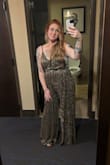 This jumpsuit was absolutely amazing! I have recently lost 90lbs and it was scary buying a size medium, but it fit like a glove! The quality and fabric are great, and I had no issues whatsoever. I got compliments all night, and I couldn't be happier. Make sure you have someone who can help you in and out when you have to go to the restroom, though (unless you are super flexible and can do the eye hook on your own). - Nicole B.