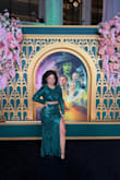 I got to attend the NYC premiere for Wicked: For Good and the dress code was Emerald City Elegance! This dress delivered! I got so many compliments and I felt great it in it. I loved the glitz and glam of the sequins and sparkles. I love my body, but I have a hard time finding items off the rack that fit perfectly, which is why I liked that it was two pieces. As someone who has a large chest (I'm actually a size 34J, but that wasn't a listed option!) and hips but a smaller waist, this was much easier to work with for my body. I struggle with regular one-piece dresses because it will be either too small in the bust and hips to fit my waist, or too big in the waist to fit the other parts of my body. Too be honest, the large top barely fit my bust, but I think an XL would have been too big. Because I'm a shorty, the large for the skirt was too long, so I had to have it hemmed by a tailor. All this being said, I still loved the outfit and would buy it again! - Felicia F.