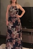 I ordered this for a wedding in California and am really happy with how it fits. The ties are easy to adjust and the neckline is really flattering. Depending on what shoes I wear, I might be able to get away with not shortening it :) - MOLLY H.