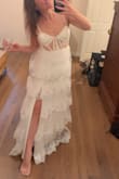 Got this on a major sale price for funzies. I feel like I wouldn't pay total full price for it. It's cute and fun. It sparkles and looks cute to twirl in. It's comfy. Maybe a tad itchy in the top. If you're between sized, pick smaller. - Victoria S.