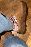 I've always wanted a pair of Clarks and I was excited I was able to purchase this pair at a discounted price. I'm a true women's 6 1/2 I ordered a 7 but a 7 1/2 would have been a better fit instead. The 7s were a bit tight at the top but they stretch a bit and slightly loosen up. Finally, the shoes aren't as comfortable as I expected they would be. I've been wearing them consistently since I got them a month ago so they should be broken in by now but my feet hurt bad after wearing them. - Maria H.