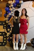 My 14 year old freshman wore this to her Boots & Bling volleyball banquet. It fit her perfectly & was such a beautiful red for the Christmas theme. We did crack up when she dropped her certificate on stage & couldn't bend over to get it. The dress is stretchy & allows for movement, but it's short on tall girls. - Rachel D.