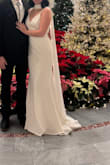 I love this dress! It fits perfectly, is very comfortable, and is good quality. It had a couple strands come loose, but they were easy to cut off. I had to get 3 inch heels because it's a little long, but other than that, it fits great! - Kendall C.