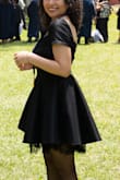 I really like the A-shape (holds its shape and it's puffy) and the back. Not a fan of the fabric, but I liked the cut so much that I ordered it anyway. There's elastic at the back and the sleeves, which I also didn't love, but it's helpful to fit different body shapes and sizes. - Stephanie O.