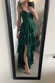 This dress is beautiful & I'm so excited to wear as a guest at a winter wedding. The straps are adjustable, however, only by a bit, and the length is a little long, so getting that hemmed, but otherwise fits perfectly in the waist. I also was nervous about the ruffles because I'm short, but they are not poofy at all. - Daniella W.