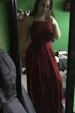 It's a little loose, but it still fits really well! The material is very lightweight and flows very nicely. Bit long for me, but with heels the length is better! Excited to wear it to prom this year! - Hannah A.