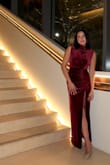 I wore this to our work holiday party. It is the perfect combo of classy and sexy with the slit. I got so many compliments on it. I ordered a size smaller and was glad I did because it really cinched me in. Also, don't be afraid to use a steamer to get wrinkles out of it! - Natalie I.