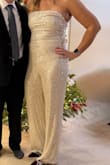 This jumpsuit is beautiful! I am 5'11 and it was the perfect length! I received many compliments on this outfit. - Jody G.