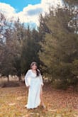 It's good quality and the dress is beautiful. I should get a Large size because it was a little too big for me. I'm 5'2, and it was long too. But overall, it was cuteeee! - Liz M.