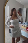 Sleeves are long for my petite figure and it's too loose in the chest area. I'm a 34DD, and I thought it should be a little snug for my ladies at least. The waist size is just perfect, so if I order a medium, it might be too small for me - Rebecca W.