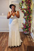 I got married on 12/13/25 in a small, intimate gathering. This dress was elegant and beautiful. My only issue was a malfunction in the actual dress; the underlay/slip was made too long. We had to pin it up so it didn't hang longer than the lace overlay. I also wish there was a way to bustle the dress as it is long, especially if you want to dance. Otherwise, I love it! - Laci B.