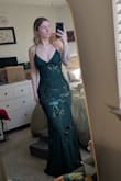 I love this dress. It feels very high quality and comfortable and is super flattering. It might run a tiny bit big in the waist, but since it is open backed with straps that tie it's pretty forgiving! - Deirdre A.