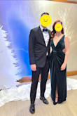 I'm between a Small and Medium, and bc other reviews said the top was a little loose, I ordered a Small. I don't have much in the way of cleavage, so I felt very safe up top and could bend over without embarrassing myself. LOL The waist is very fitted, but not too uncomfortable. The material is thick, and the skirt draped nicely. I felt amazing in this at my husband's big work Christmas dinner. He wore a matching green velvet bow-tie! :-) - Traci D.