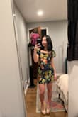 Purchased for a company holiday party and was very pleased with the fit and style! Not something I'd usually buy, but saw an influencer wear it and I got it on sale during Black Friday. I was deciding between an XS and S, and very happy I went with the small. The length was great on me, but I'm pretty short (5'2"), so tall girls beware. Slight gaping on the chest but nothing dress tape can't fix. Overall, I thought the fit was great, I got many compliments on how well the dress fit me. - Allison J.