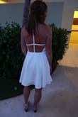 The dress fit true to size and was extremely comfortable. The material wore very well and didn't wrinkle up when I sat down. I wore this on a recent trip to Montego Bay and everyone just loved it!! :) - Stacey L.