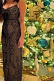 I purchased this dress for a Christmas party. The dress is true to size and it fit perfectly. It wasn't too tight around the mid-section, so no need for uncomfortable spanx which is a plus. - Kelly P.