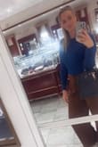 I love this top. I have it in white as well, very chic and simple, and not super light but not heavy. It's a great sweater. That'll keep you just warm enough without overheating. - Brianna R.