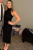 I probably could've gone down to a small, but I didn't want to risk it being too tight on my chest or arms. It was roomy in the hips and stomach, and if you're a little bloated, the design on the dress helps hide any of it. Super flattering. - Kathryn M.