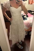 This dress is cute and flattering. I ordered it in my typical size, and it fits. It just has to be steamed. - Sylvia M.