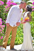Wore this dress for my wedding in St. Lucia and it was absolutely perfect. The dress was not as heavy as some people described in the reviews and it was true to size. I "trashed the dress" by jumping in the ocean and it was not see through!! Amazing dress and I got so many compliments. - Linnette H.