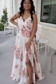 So I absolutely love this dress . Bought it for a wedding I'm going to this week. I originally ordered in a M as recommended because I wear a 32 DDD 
Although the medium gave me more room for my boobs, it didn't fit anywhere else. 
It's really meant to be worn with no bra, but as a recently stopped breast feeding mama, I need the support

The size small I have now fits perfectly except I have to pin the top to cover my strapless push up bra. 
Very beautiful and flowy, no stretch , adjustable straps is a plus . sweeps the floor so heels are needed if you're short like me. - Nazzirah A.