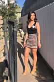 Received compliments all day, skirt is absolutely gorgeous! Great quality,Fit great, the material is a little stiff so do be careful when sitting down just needs a little adjusting or crossing of the legs ;) but it is very comfortable. It's a high waist skirt, I wore it with a crop top. So happy I made this purchase. Can't wait to wear it again!! - Ariana