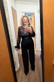 Love, love, love this jumpsuit! Classy looking. Dressy. Perfect for formal occasions. The medium fit, but the top does not really give, so I ordered a large, and the top was much more comfortable.  Customer service was great since I had to return one, just seems to take a while to get a refund button I'm sure it will come soon. - Randi H.