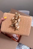 I absolutely loved this clutch. The shell charms were so cute, and I loved how they stood out from the bag. I paired this with a lulus ombré sunset dress, which made the whole look feel fresh for summer. - Rebecca G.