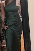 This dress is beautiful. I did have to get it tailored as it was very long for my petite frame. The slit was a little too much for me and so I also had to get that closed a bit. Otherwise, it was perfect. I received lots of compliments all night. - Janna R.