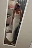 The second I tried on this dress I knew it was going to be my wedding gown! Fits like a glove, but if you're in between sizes order up. Excellent quality fabric. Easy to dress up or dress down with accessories. Love it. - Allyssa S.