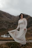 Wore this dress for my wedding elopement in the Scottish Highlands and it was perfect! It was a little tight but I was unexpectedly 8 weeks pregnant by this point. The zip is a little finicky but still works, just be mindful it doesn't have any stretch. Loved at my height I had a little train and the lacey detail looks more expensive then it was. - Larissa E.
