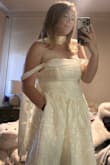 I love this dress so much and im pretty sure this will be my wedding dress! I love the corset for it to fit perfectly. I plan to have it hemmed for my height; it's too long even with 3" heels. I added my own satin ivory scarf to complete the look, and it's perfect (will not be wearing a veil). I also have a sticky bra to fill in a bit because there are no sewn in cups. My favorite part, though, is the POCKETS!! - Amanda L.
