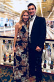 The dress is true to size and the straps in the back allow you to make it as tight or loose as you please. I wore 3-4 inch heels with the dress and it barely touched the ground which was perfect. Very comfortable! - Laura M.