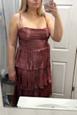 I really love the fabric and color of this dress, but the bust has no support if you have a bigger chest. It really flattens me out, and I don't love how the top looks. I might try to sew in some bras cups to make the top have some more shape. It also is really hard to zip past the waistline by yourself so definitely need someone to help. It is good quality overall and would look amazing if you have a small chest. - Abby G.