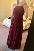 I am wearing this as a bridesmaid dress for a friends wedding this summer and I cannot wait to wear it! It's very elegant, but the open back gives it just the right amount of sexiness without being overdone. Love that the bottom of the dress is very flowy which will be perfect for a hot summer wedding. The hem does touch the floor, so it is a bit long even for me being tall with long legs, but with heels it will be perfect. I would highly recommend this dress to anyone considering it! - Lacey A.