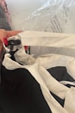 Wow, the quality of this dress was disgusting. Arrived stained and unwearable. Also extremely long. They put no thought into the design of this. It felt like something from SHEIN but worse. I will never order from this company again. - Julia S.