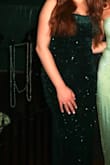 I wore this dress to a Mardi Gras ball, and it was perfect! It fits true to size. I loved it! - Alana A.
