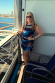 The color and patterns of this dress are absolutely gorgeous. I love the mesh and the drop waist. This was perfect for my cruise. My only complaint is that it is slightly short, but that is likely due to my large backside. I still wore it with confidence, and I got many compliments. - Becky K.
