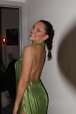 The dress is lined and had to be hemmed even with heels on (about 5'9 with heels). Runs big, I got a small and am normally medium or large. - Casey W.