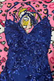The dress is super nice, and the material is great for the price! It's the tiniest bit loose on the waist, so if you want that super-fitted look, I would recommend sizing down! Super sparkly, I love it - Victoria G.