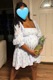 Love this dress! Purchases it for maternity as I got bigger. Ordered a L and it fits me perfectly at 7/8 months pregnant. (Pineapple for size reference of my baby) - Chelsea B.