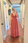 I ordered this dress in hopes it would fit my growing belly for a formal wedding! Had to get the shoulders and hem altered as it was too long, but otherwise fits great. Lovely color and excited to wear it for the event. - Melissa B.