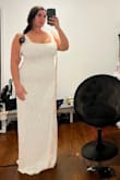 I love this dress. I'm like a wedding dress size 16. I ordered a large, and it fits snug (see pictures). I ordered a size larger cause I'm going for a looser fit. I love the whole beaded look! - Alia A.
