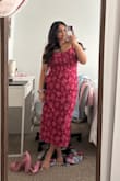I ordered up 1 size based on the reviews I had read, and I have to agree with them! The dress fits great, but it doesn't have a lot of give, so sizing up was the right decision! - Anvi T.