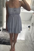 Super cute dress, good quality, can be used for so many occasions. I'm usually between a small and medium- I ordered a small, and it fits perfectly! If you are in between sizes, I would size down for this dress. The band in the middle is stretchy, so lots of wiggle room. Tall girl friendly as well! - Maren H.