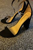 Size 7, my foot is not narrow, but it's not wide, and this shoe is very comfy. 

So sexy and so very comfortable! Love the black, and they're so cute I'd buy them in other colors. A great shoe for the price. 

I've only worn them around the house so far, but no pain, and they do not rub my feet at all anywhere. Potential pain in the ball of my foot. 

Very sexy and cute! Can't wait to wear them out!! - Alexandria W.