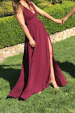 I bought this dress to wear to prom, and it looks gorgeous! It fits nicely in the waist, and the slit gives it a sexy appeal to complement the classiness of the dress. Will have to get it shortened, but that just comes with the territory of being petite. Would highly recommend this dress! - Lindsay S.