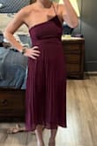I have a larger rib cage so the upper bit is a tad bit tight as it doesn't have much give or stretch. But it is still very comfortable, and can probably skip the bra! color is super pretty, planning on wearing to may wedding. - Murielle T.