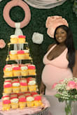 I'm 9 months pregnant & I just had my baby shower! I was cutting it close. I wasn't sure how big I'd be, so I waited until the last minute to order; best decision ever! It's stretchy and fitting. I was able to move around & I still looked classy. - Brelle L.